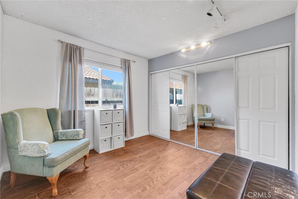 3415 Siskiyou Circle Riverside, CA 92503 - Photo 22 of 41 a spacious bedroom with a bed and furniture