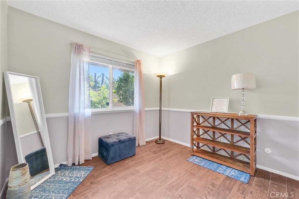 3415 Siskiyou Circle Riverside, CA 92503 - Photo 23 of 41 a bedroom with furniture and a window