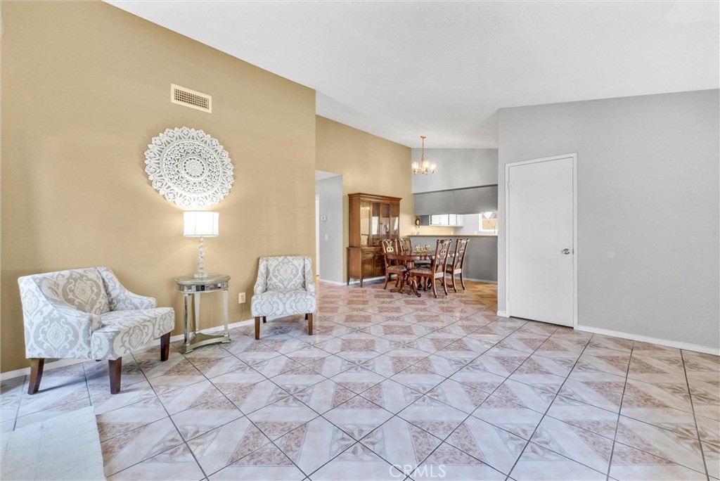 3415 Siskiyou Circle Riverside, CA 92503 - Photo 4 of 41 a view of living room filled with furniture and a table