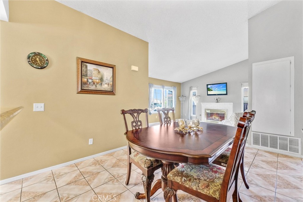 3415 Siskiyou Circle Riverside, CA 92503 - Photo 7 of 41 a view of a dining room with a table and chairs
