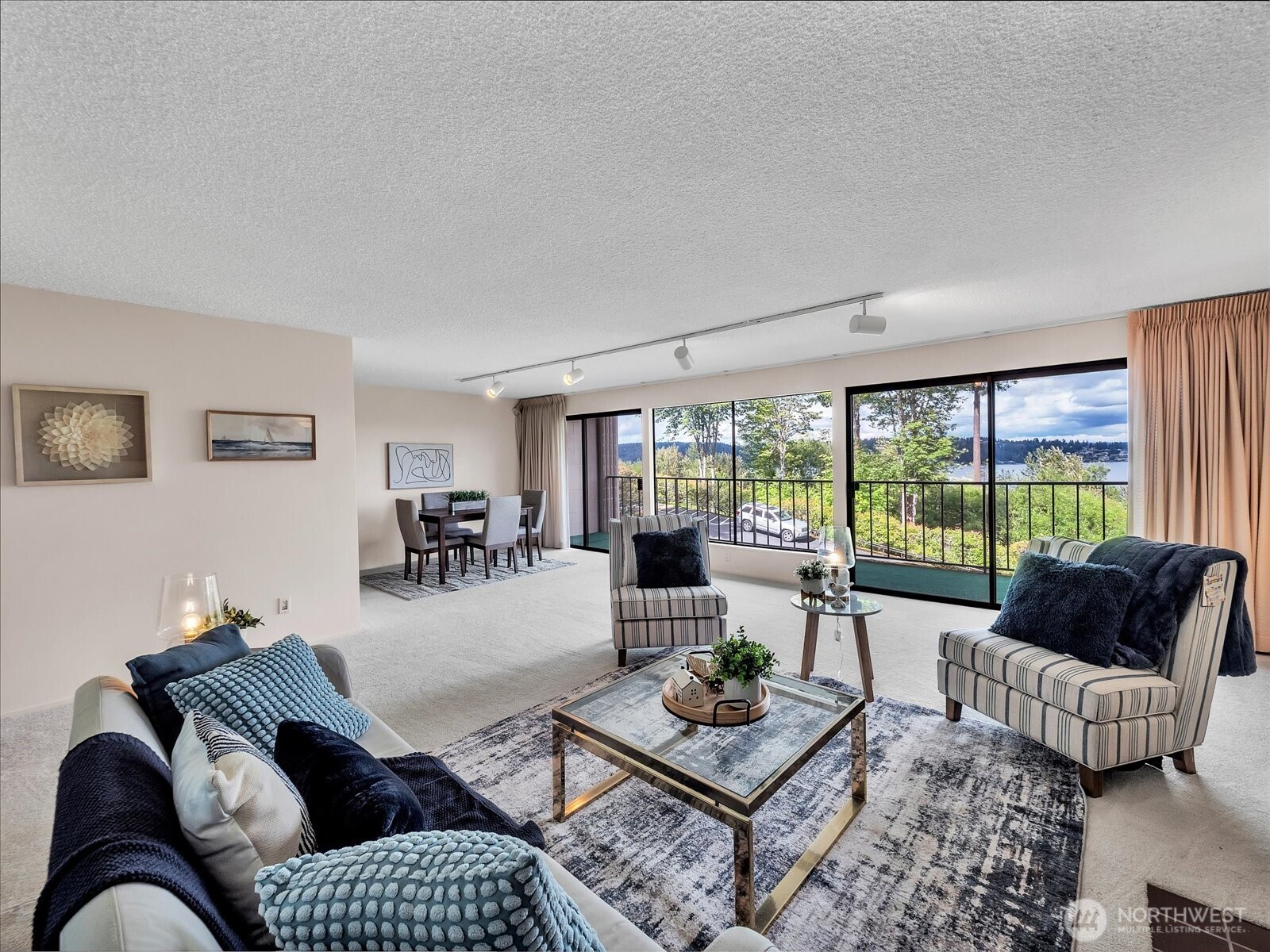 8001 Sand Point Way Northeast, Unit C57 Seattle, WA 98115 - Photo 3 of 23 a living room with furniture and a large window