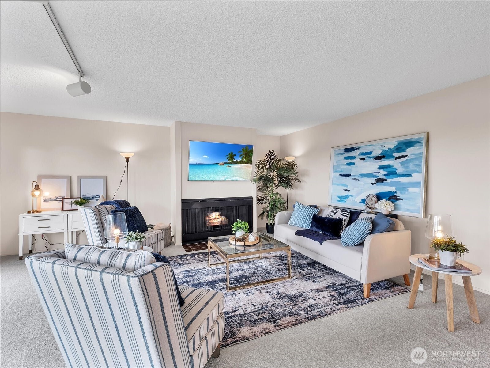 8001 Sand Point Way Northeast, Unit C57 Seattle, WA 98115 - Photo 4 of 23 a living room with furniture and a fireplace