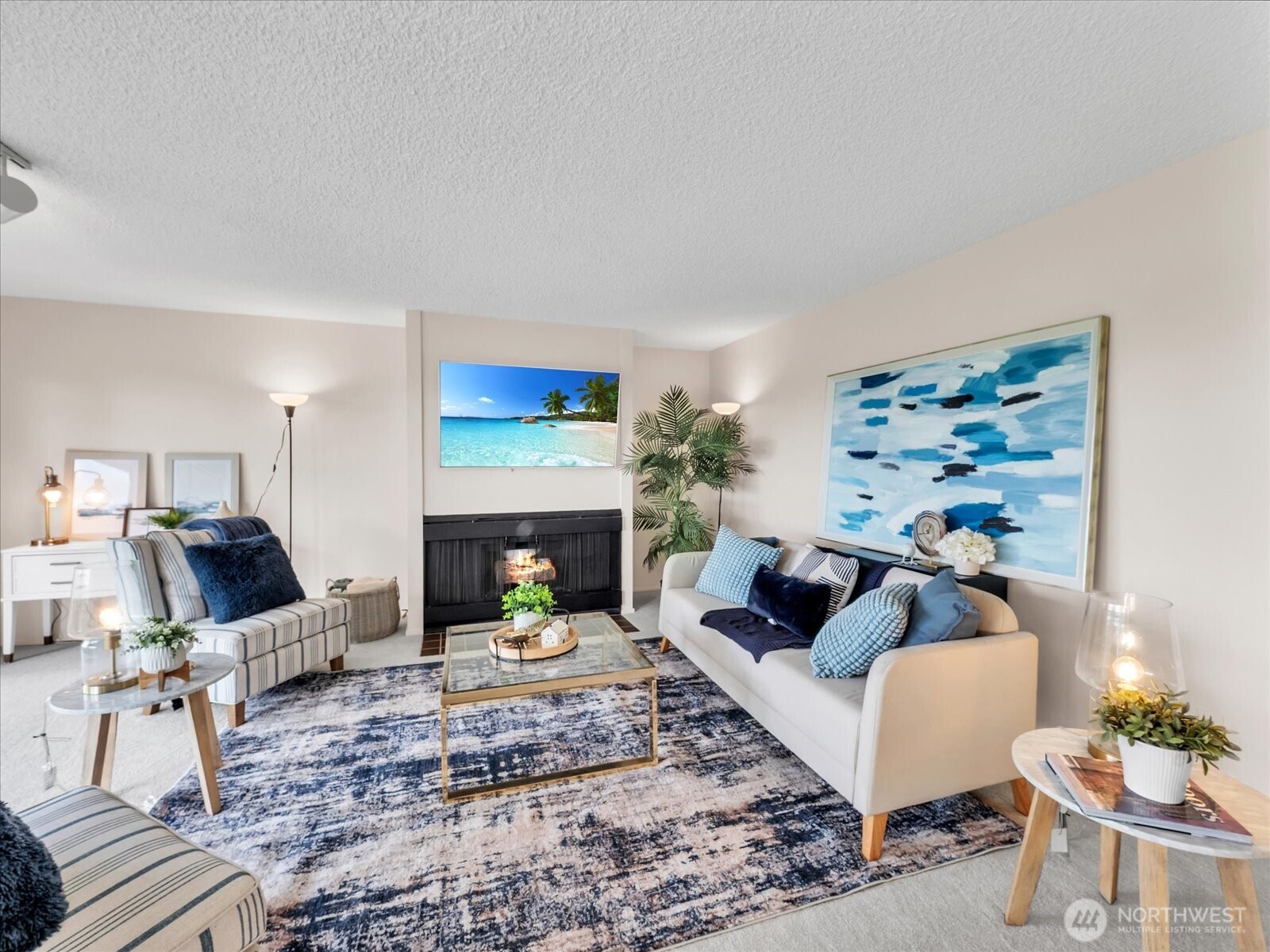 8001 Sand Point Way Northeast, Unit C57 Seattle, WA 98115 - Photo 5 of 23 a living room with furniture and a fireplace