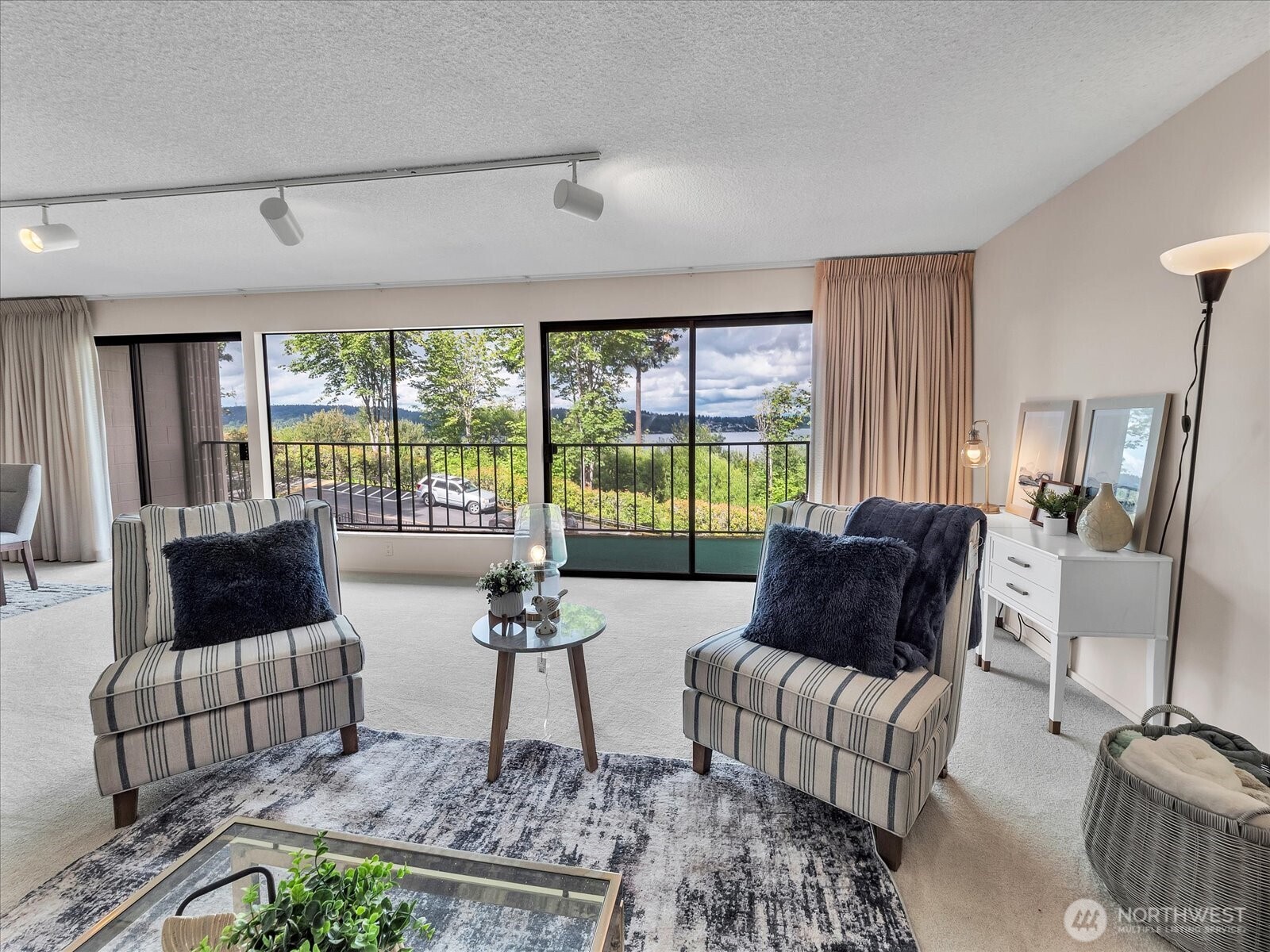 8001 Sand Point Way Northeast, Unit C57 Seattle, WA 98115 - Photo 7 of 23 a living room with furniture and a large window