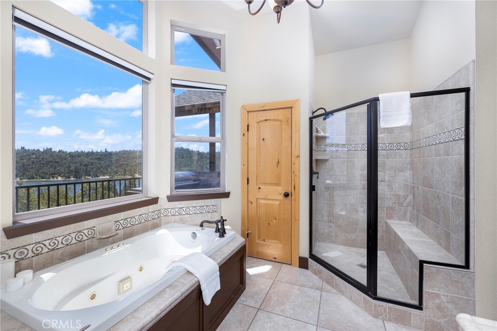 39828 Granite Ridge Lane Bass Lake, CA 93604 - Photo 32 of 66 Primary bath step in shower plus jetted tub