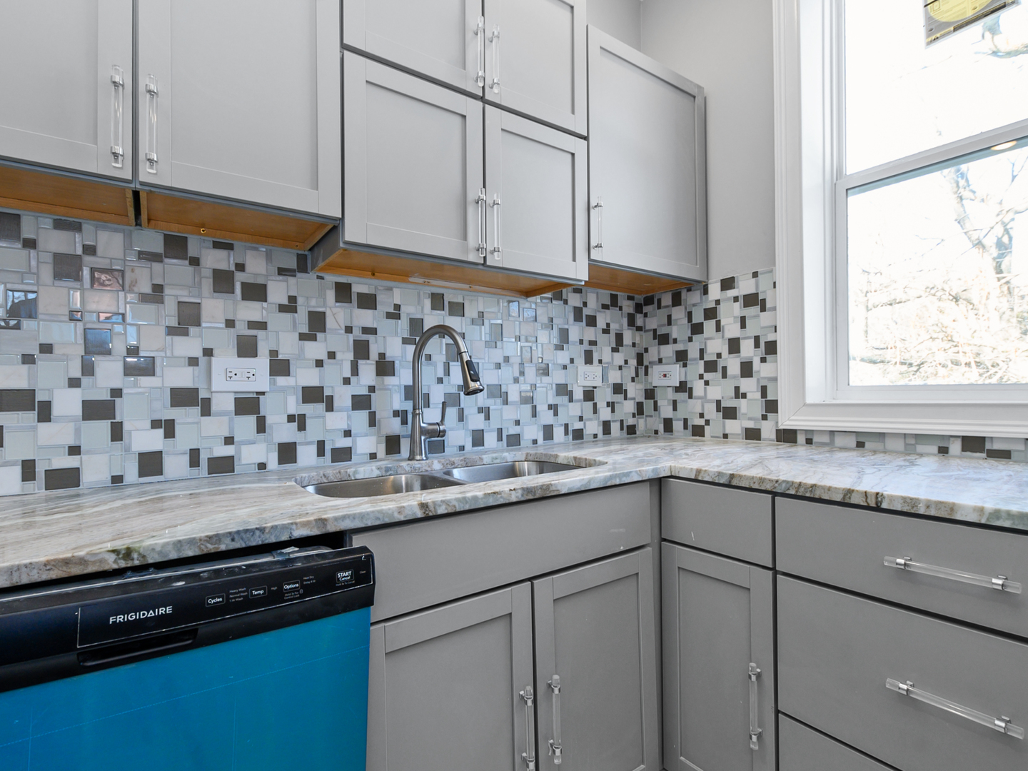 7305 South Sangamon Street Chicago, IL 60621 - Photo 17 of 29 a kitchen with granite countertop a sink and a stove