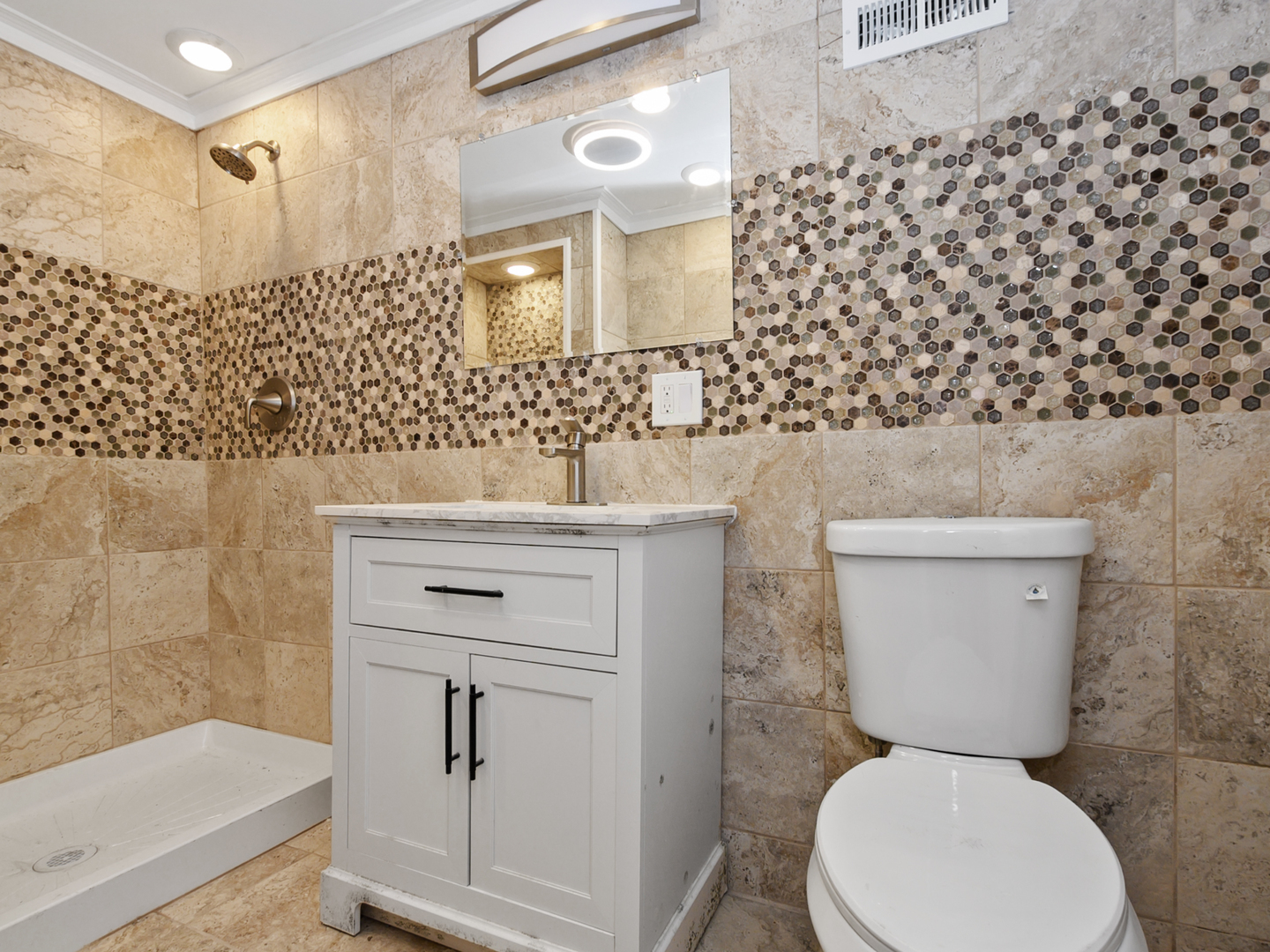 7305 South Sangamon Street Chicago, IL 60621 - Photo 27 of 29 a bathroom with a toilet sink and mirror