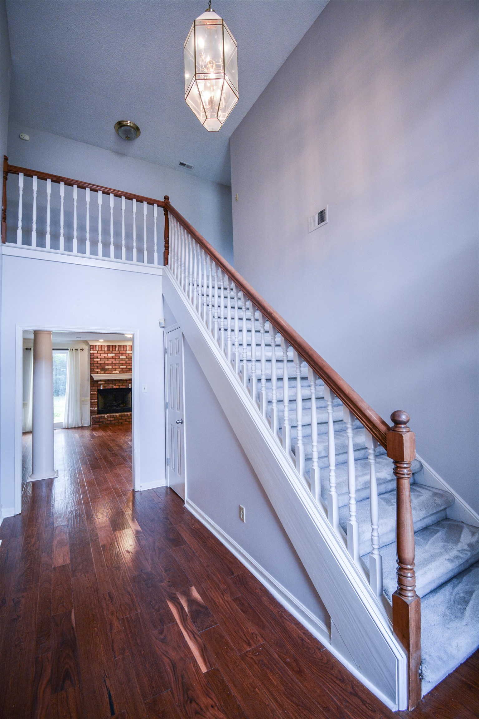 745 Roehampton Court Collierville, TN 38017 - Photo 25 of 40 a view of staircase with wooden floor and staircase