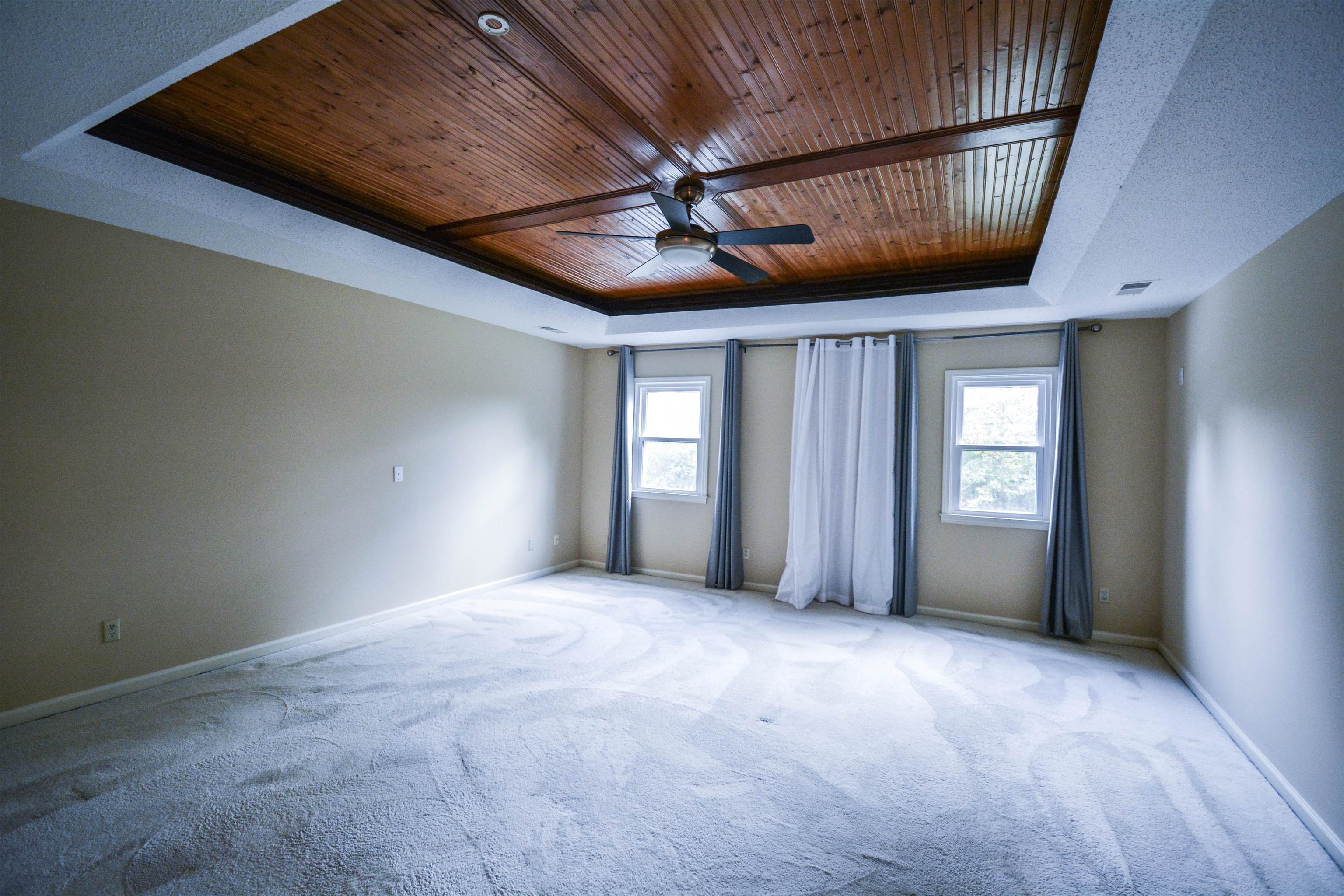 745 Roehampton Court Collierville, TN 38017 - Photo 30 of 40 a view of a livingroom with a ceiling fan and window