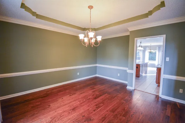 a view of livingroom with wooden floor