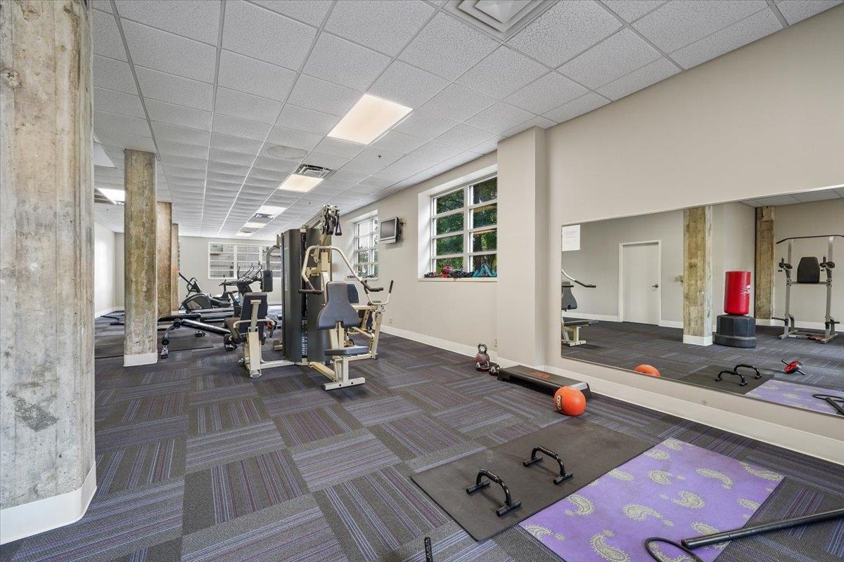 648 Riverside Drive, Unit 207 Memphis, TN 38103 - Photo 23 of 34 a view of a room with gym equipment