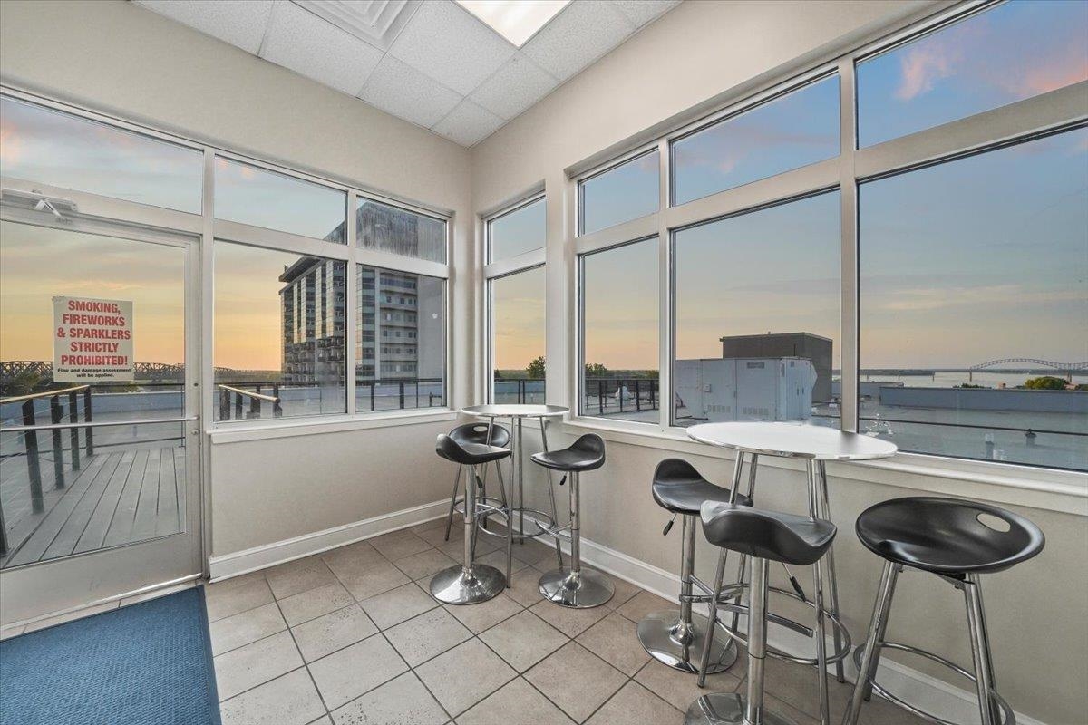 648 Riverside Drive, Unit 207 Memphis, TN 38103 - Photo 30 of 34 a open kitchen with a sink and breakfast area