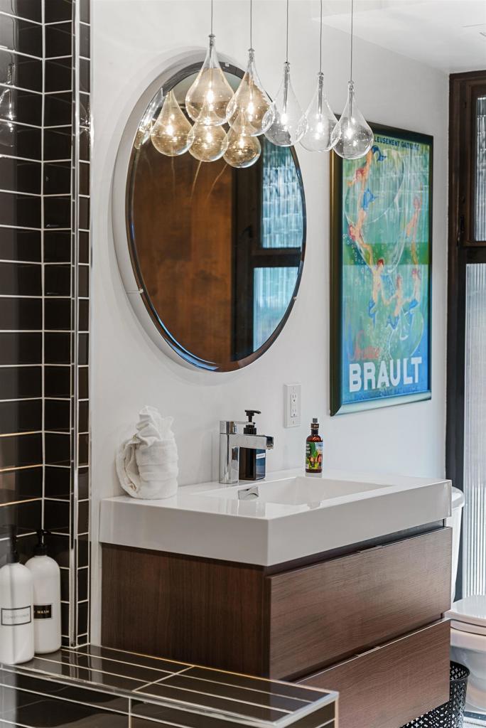 754 El Rancho Drive El Cajon, CA 92019 - Photo 18 of 55 a bathroom with a sink mirror and vanity