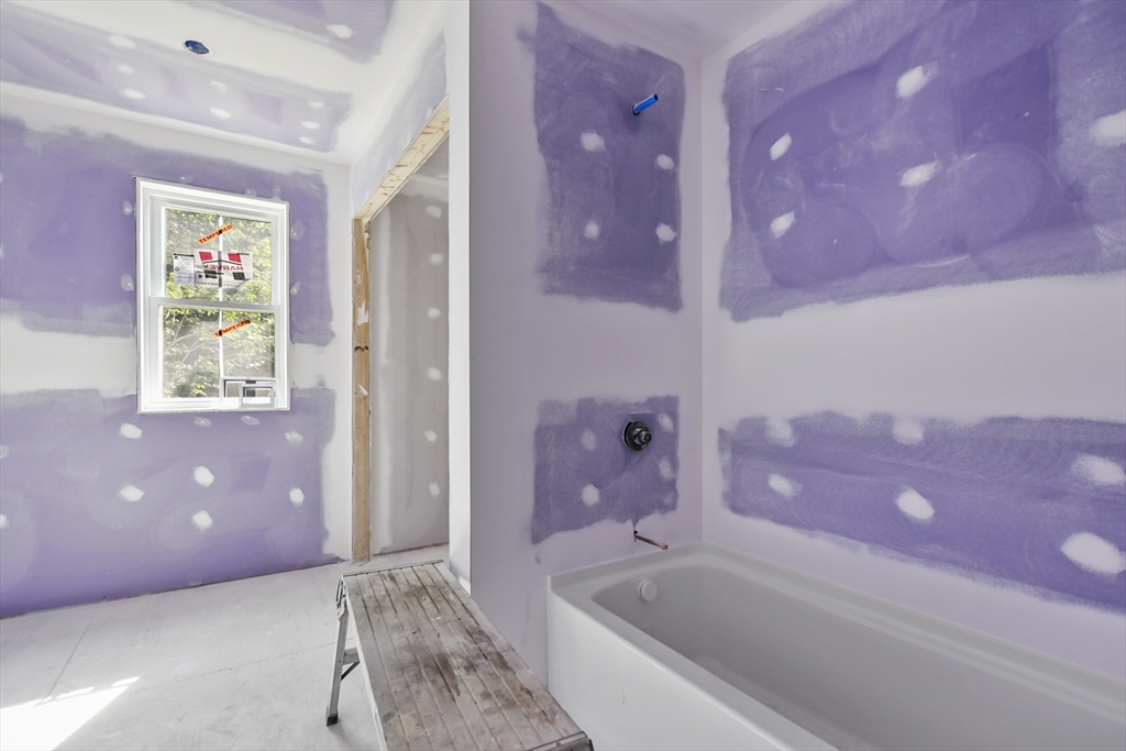 101 Folly Mill Road Salisbury, MA 01952 - Photo 15 of 32 a bathroom with a bathtub and shower