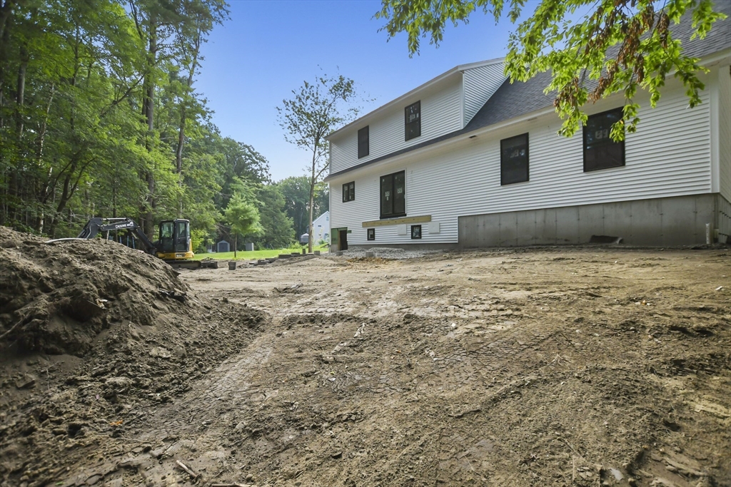 101 Folly Mill Road Salisbury, MA 01952 - Photo 3 of 32 a view of a house with a yard