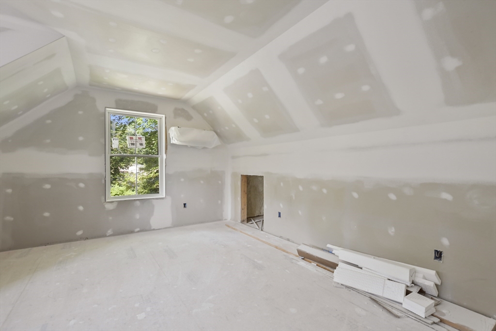 101 Folly Mill Road Salisbury, MA 01952 - Photo 9 of 32 an empty room with windows and mirror