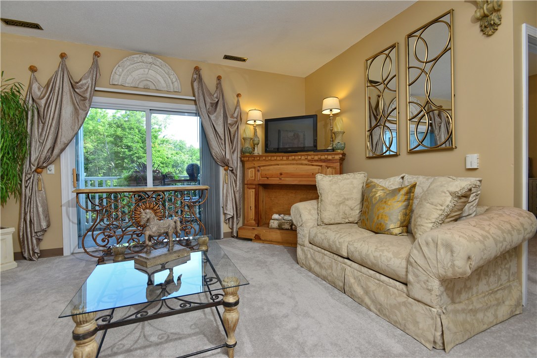 78 Mill Street, Unit 101 Woonsocket, RI 02895 - Photo 5 of 37 Plenty of natural light from this living room slider.
