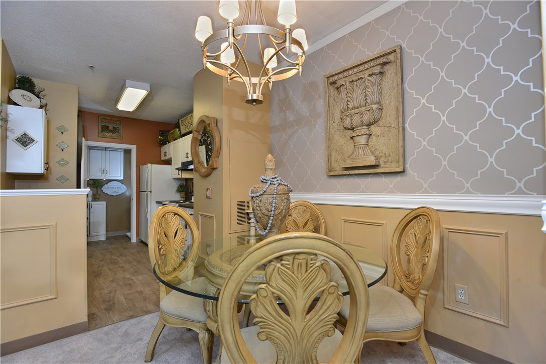 78 Mill Street, Unit 101 Woonsocket, RI 02895 - Photo 10 of 37 Good flow from kitchen to dining area.