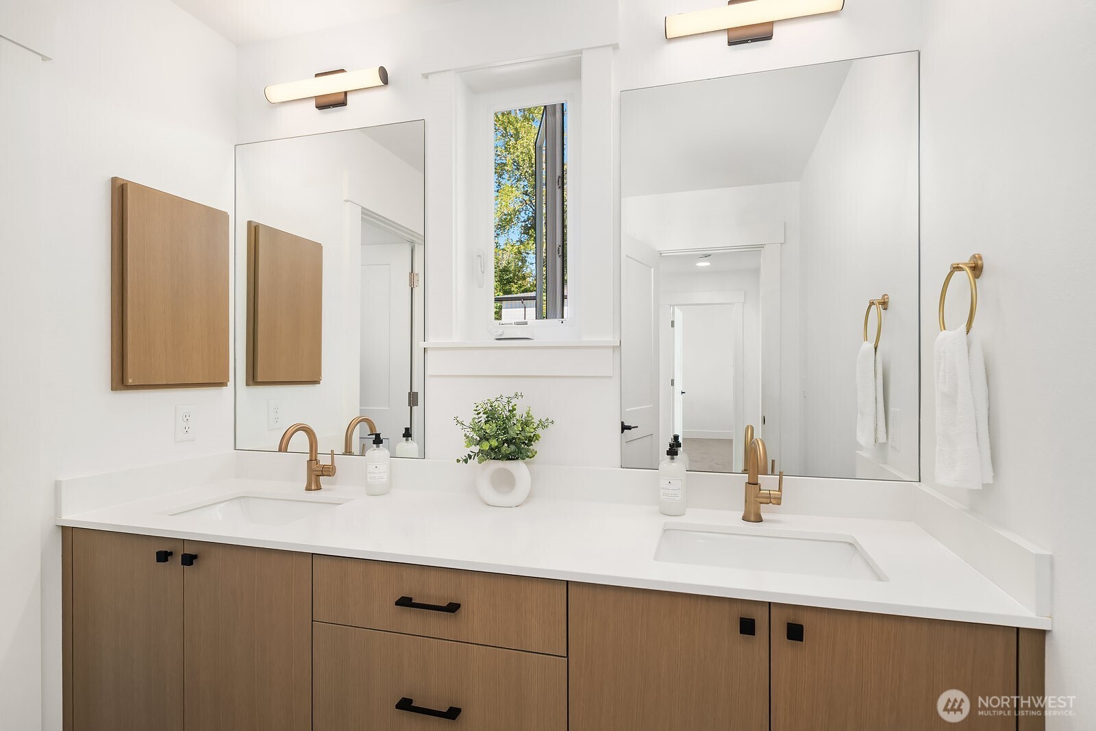 4255 216th Place Southeast Issaquah, WA 98029 - Photo 20 of 37 a bathroom with a sink and a mirror