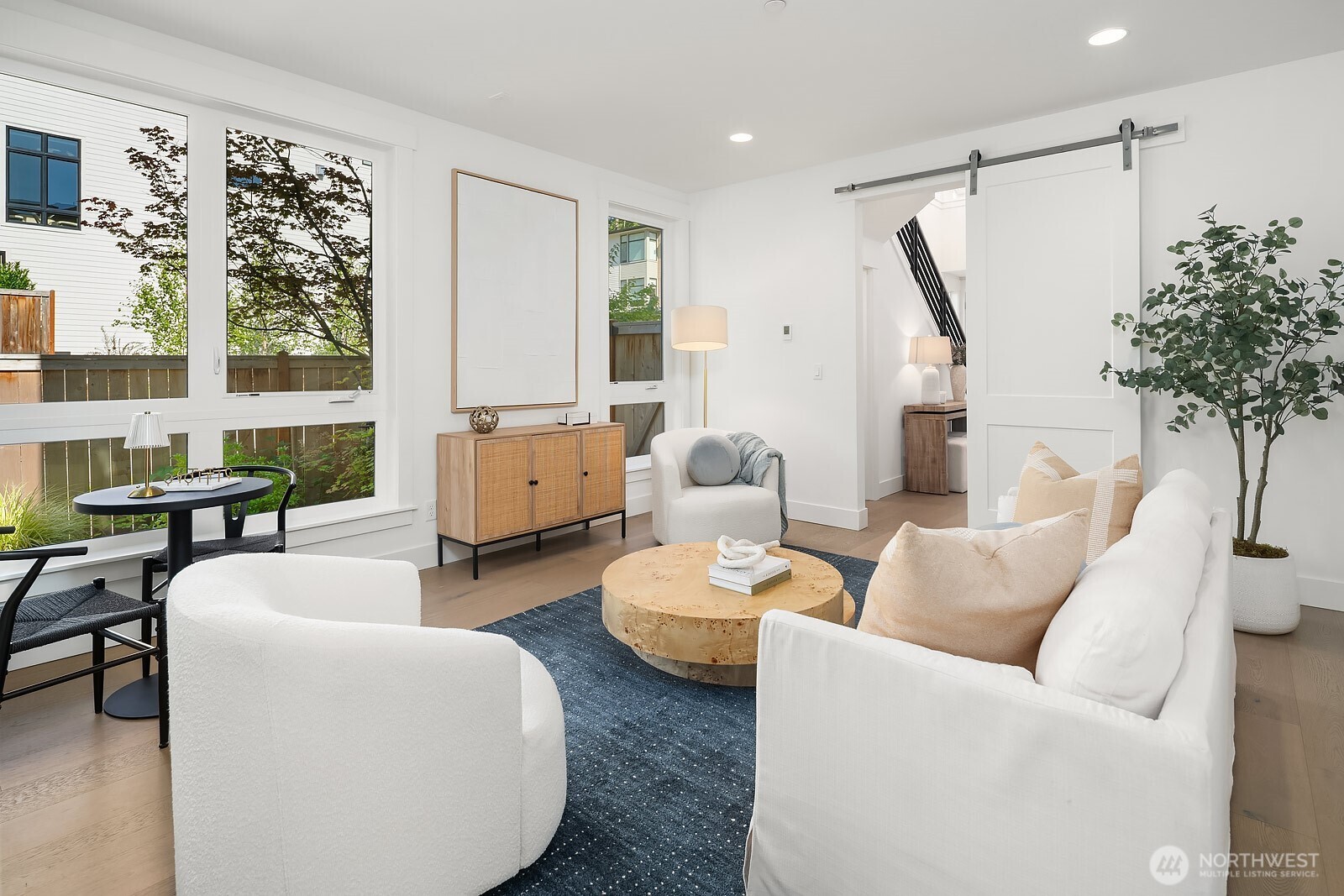 4255 216th Place Southeast Issaquah, WA 98029 - Photo 24 of 37 a living room with furniture and a large window