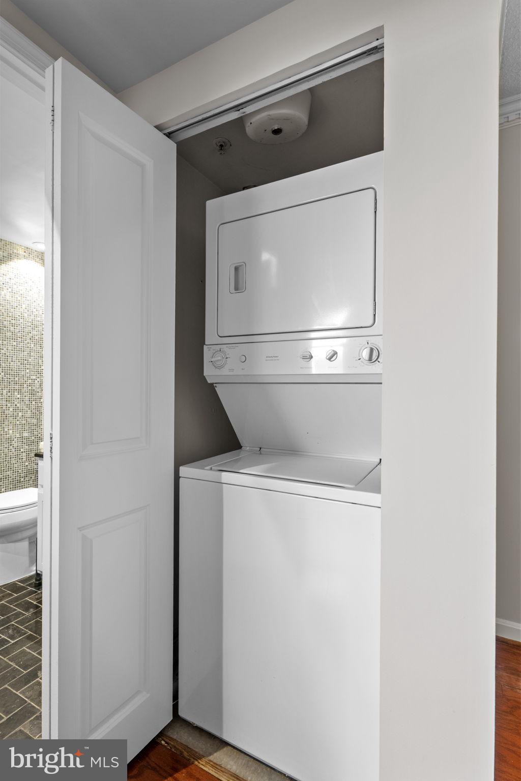 880 North Pollard Street, Unit 224 Arlington, VA 22203 - Photo 24 of 50 a utility room with dryer and washer