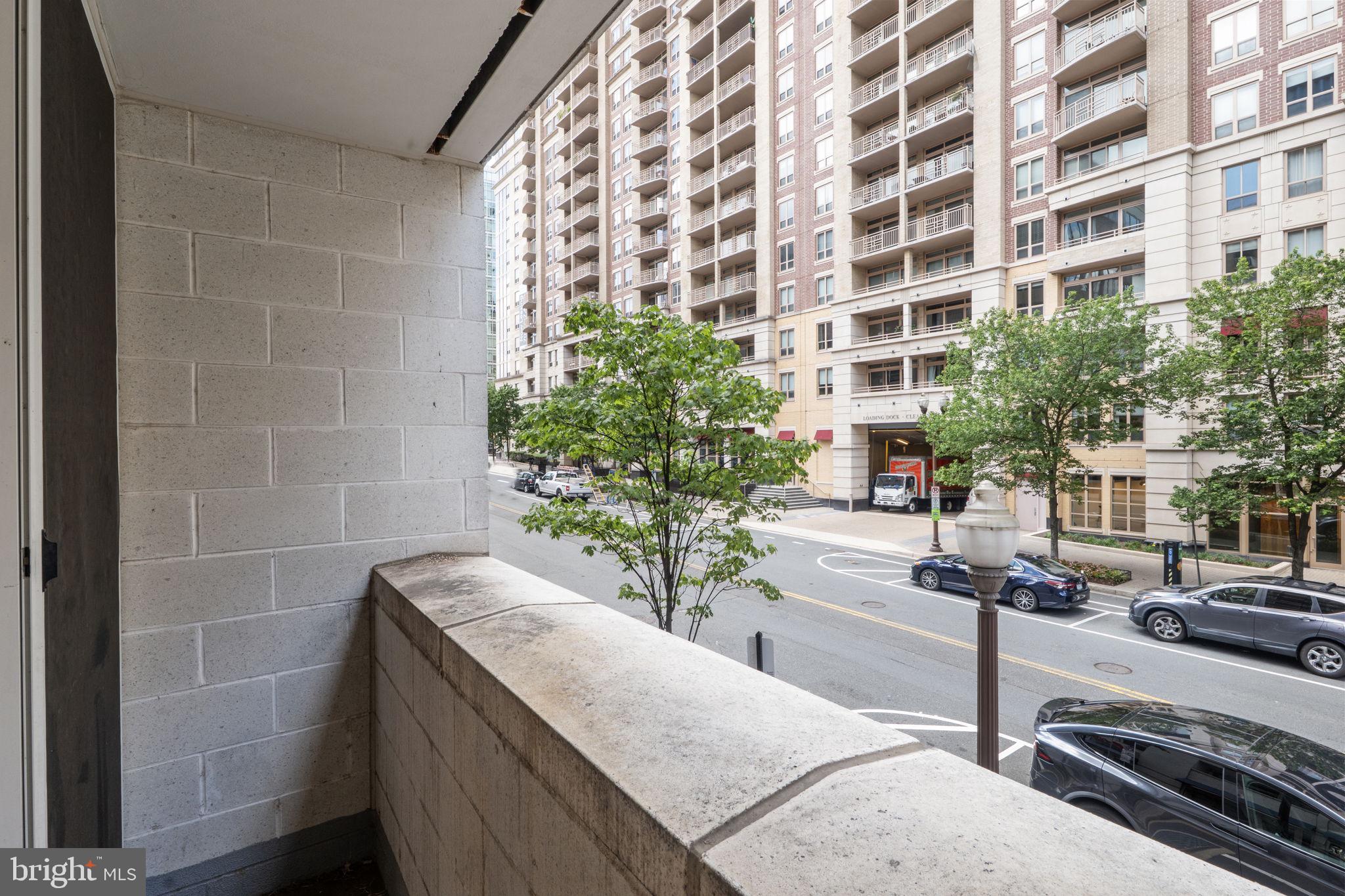 880 North Pollard Street, Unit 224 Arlington, VA 22203 - Photo 26 of 50 a view of a street with tall buildings