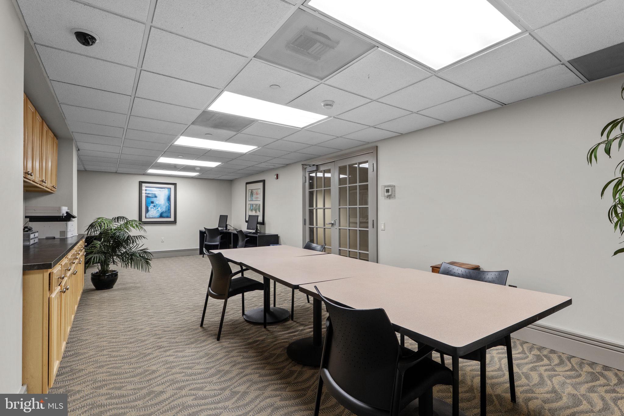 880 North Pollard Street, Unit 224 Arlington, VA 22203 - Photo 39 of 50 a view of a dining room with furniture window and wooden floor