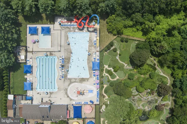 an aerial view of a house with a garden