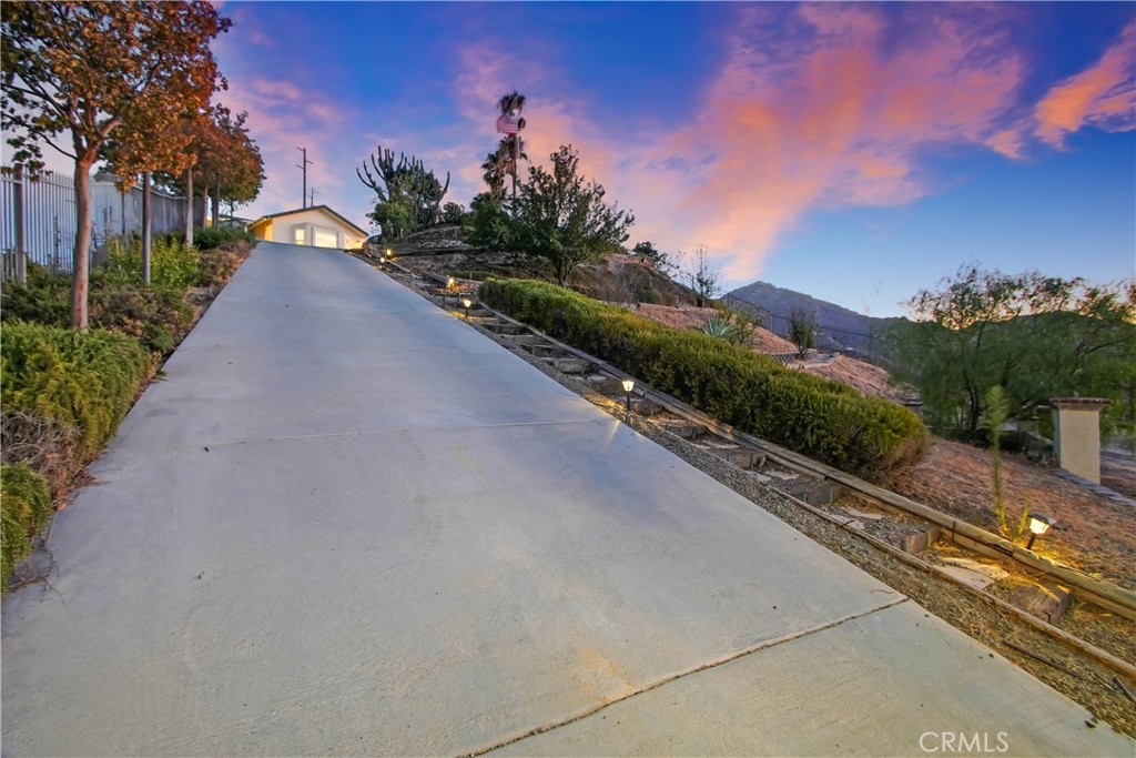 8555 Pigeon Pass Road Moreno Valley, CA 92557 - Photo 25 of 63 a view of a street with a houses