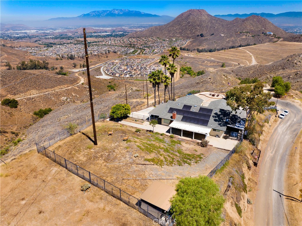 8555 Pigeon Pass Road Moreno Valley, CA 92557 - Photo 58 of 63 a view of a swimming pool with a lake view