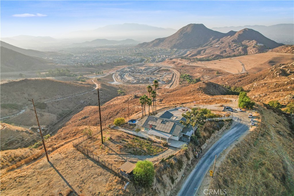 8555 Pigeon Pass Road Moreno Valley, CA 92557 - Photo 59 of 63 a view of a sky from a balcony