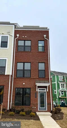 a front view of a building with glass windows