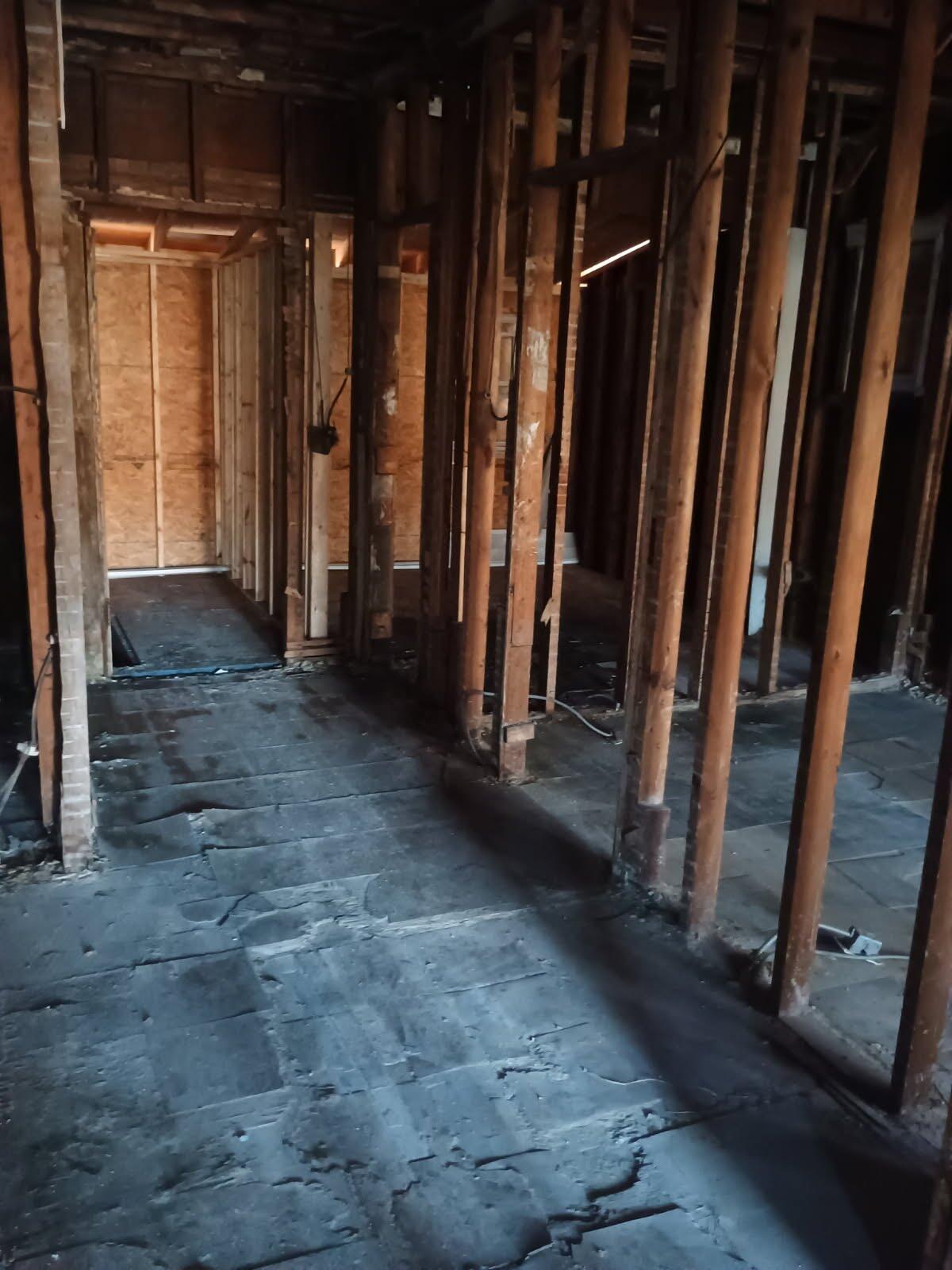 1105 West 15th Avenue Gary, IN 46407 - Photo 11 of 14 a view of a room with wooden floor and stairs