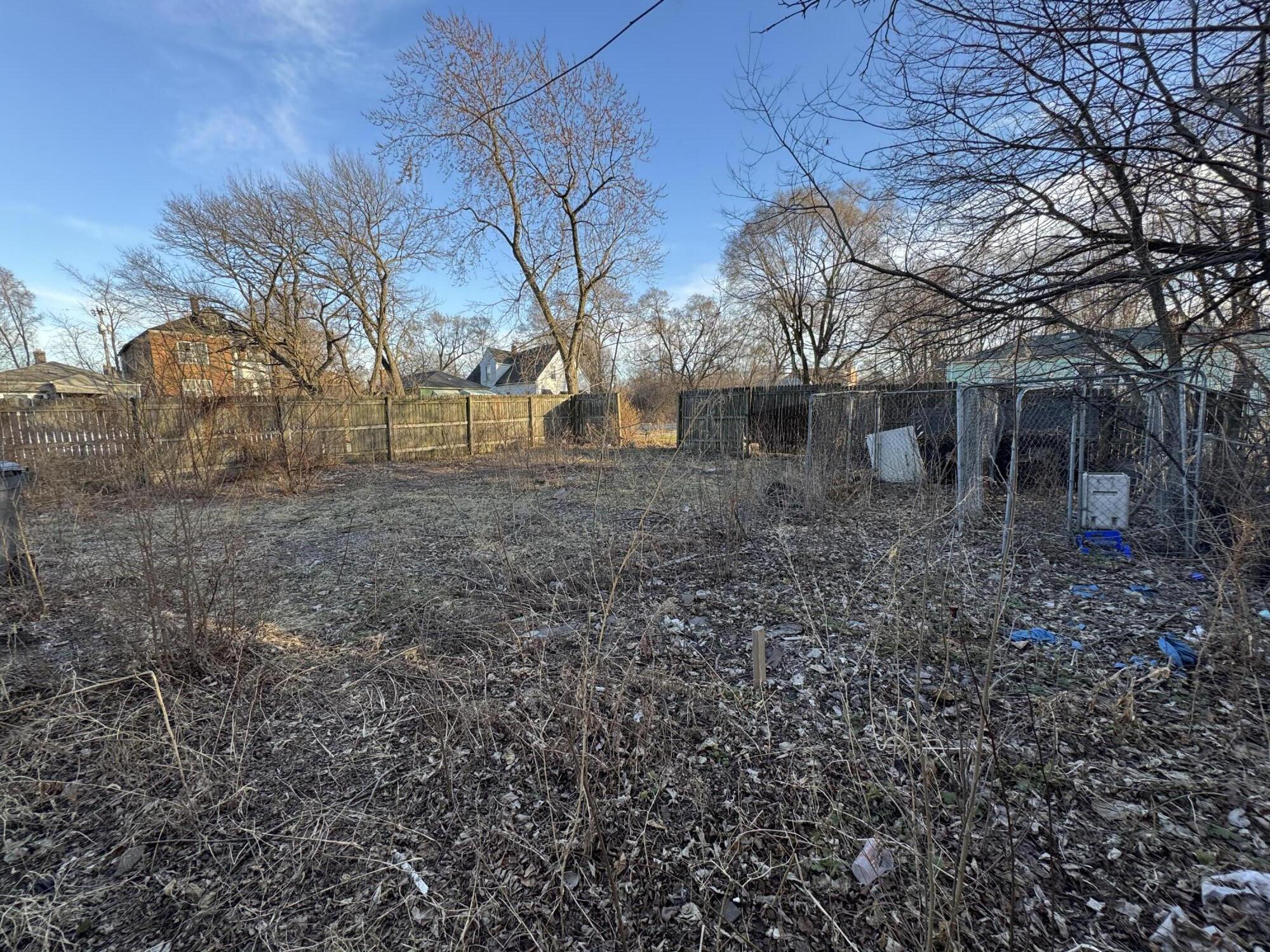 1105 West 15th Avenue Gary, IN 46407 - Photo 5 of 14 a view of a house with a yard