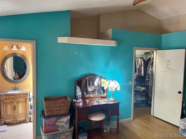 a room with gym equipment and a floor to ceiling window