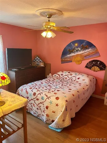 a room with furniture and flat screen tv