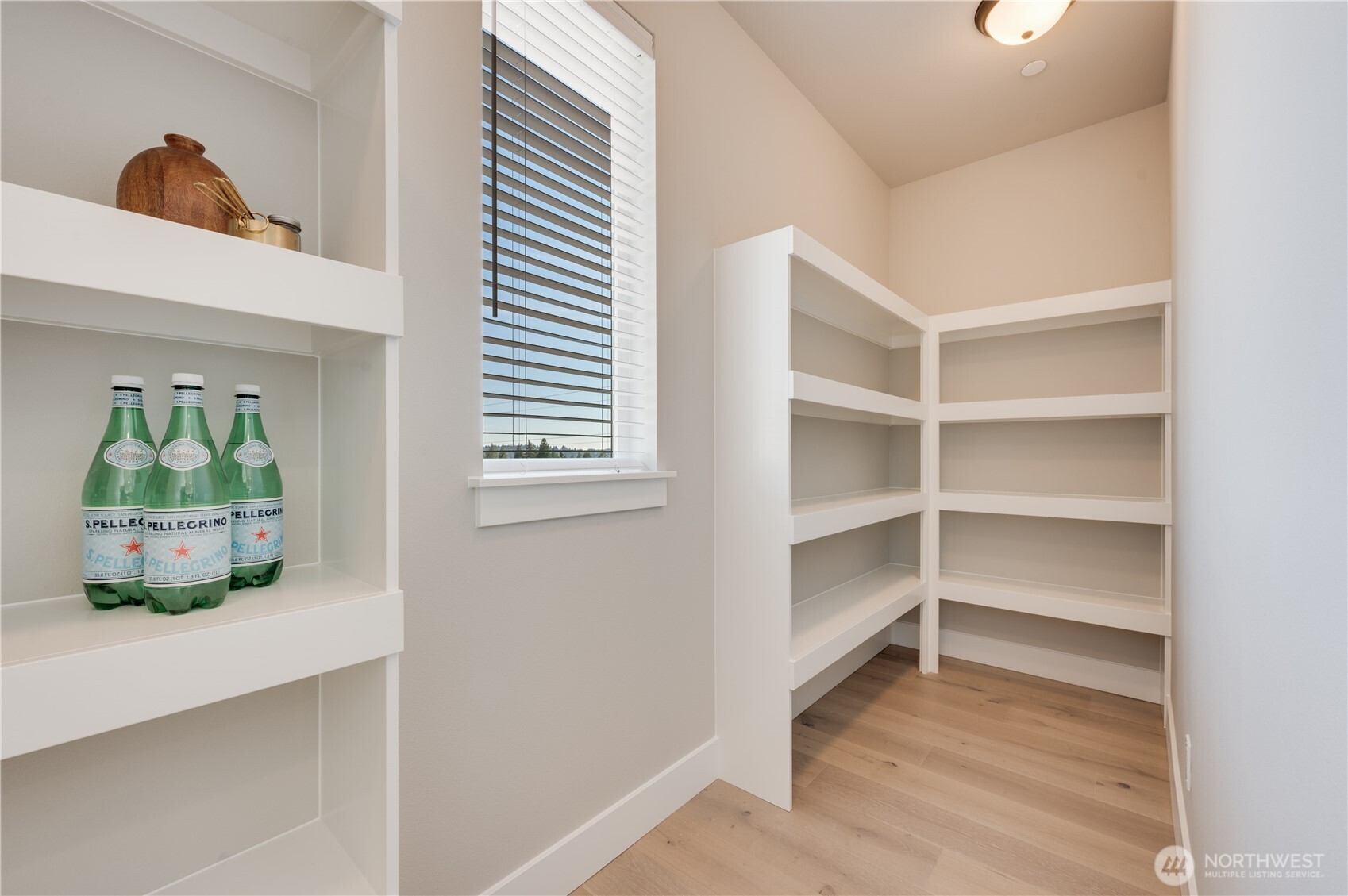 20411 125th Avenue Northeast, Unit SM 20 Bothell, WA 98011 - Photo 13 of 34 a view of room with window and wooden floor