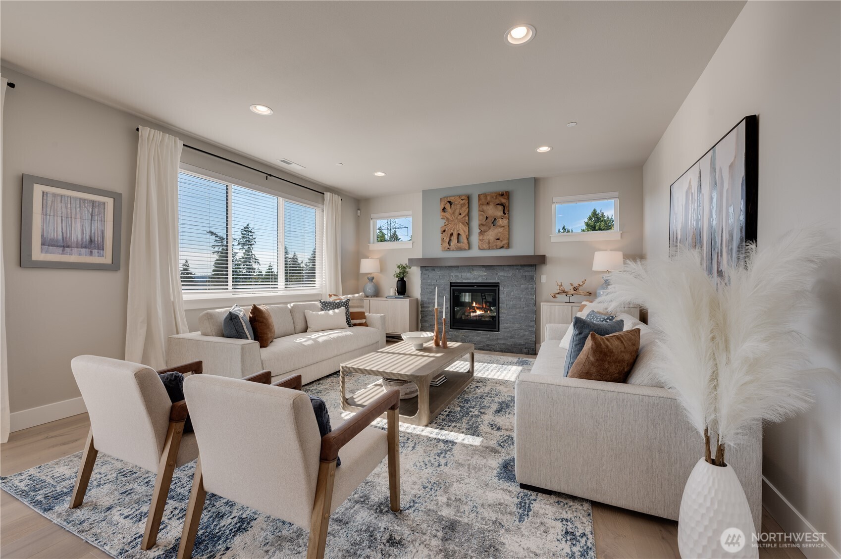20411 125th Avenue Northeast, Unit SM 20 Bothell, WA 98011 - Photo 20 of 34 a living room with furniture and a fireplace
