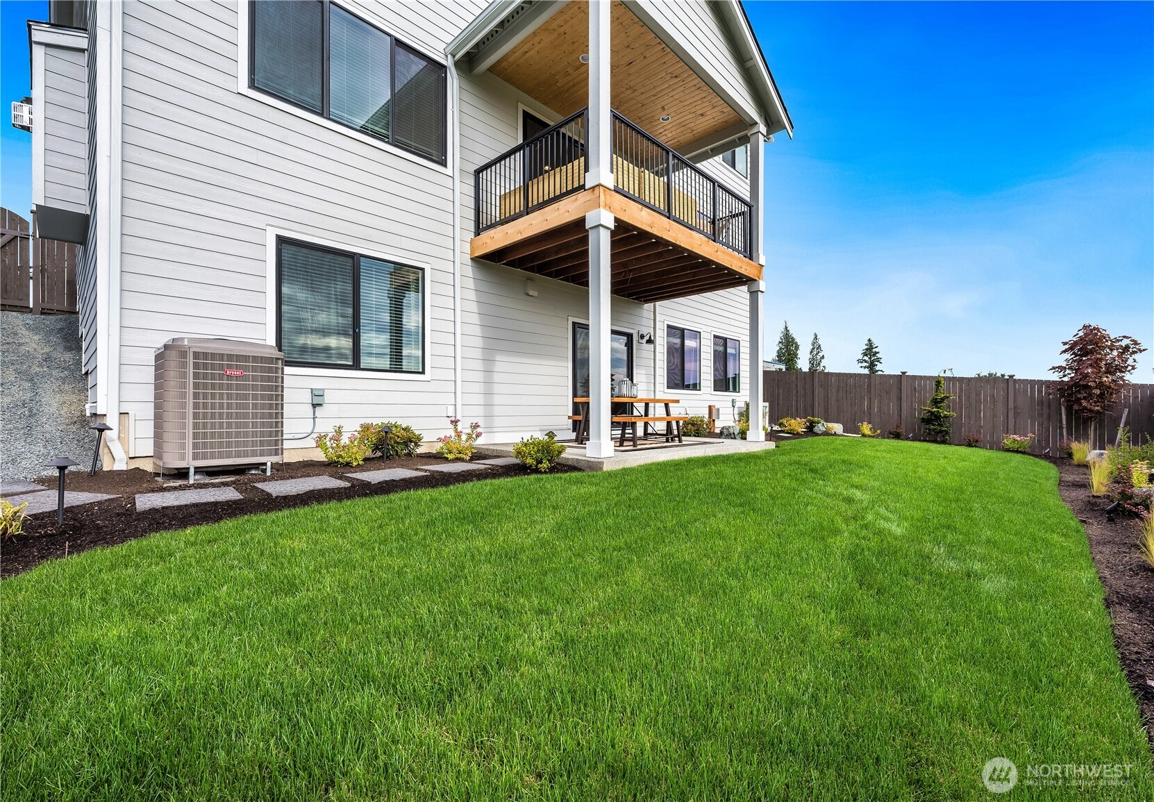 20411 125th Avenue Northeast, Unit SM 20 Bothell, WA 98011 - Photo 5 of 34 a view of a house with backyard