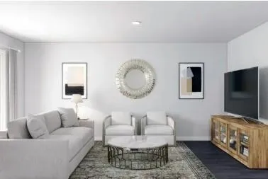 a living room with furniture and a flat screen tv