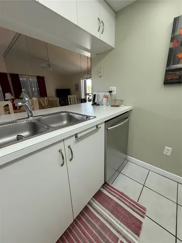 a view of balcony with a potted plant