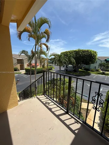a bedroom with furniture and a chandelier