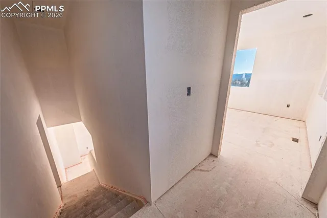 a view of a bathroom with mirror