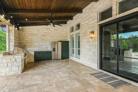 a view of a hallway with seating space