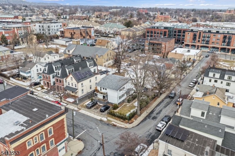 an aerial view of a city with lots of residential buildings