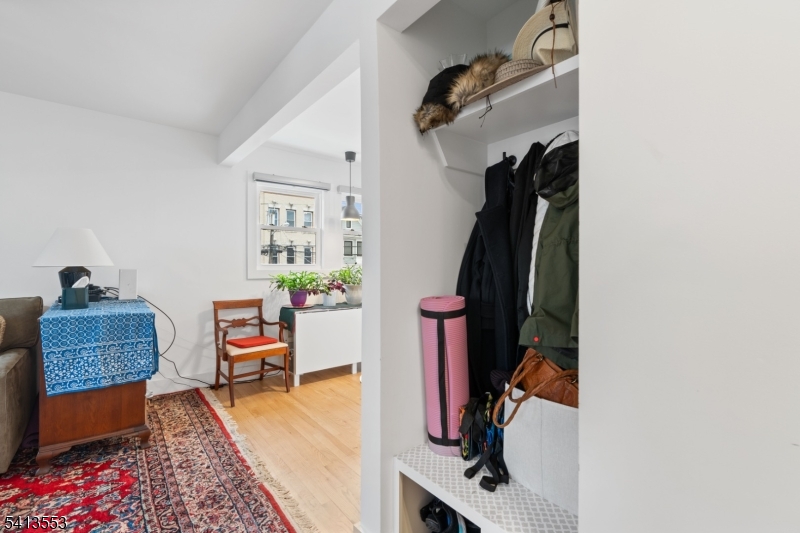 5 Washington Street Montclair, NJ 07042 - Photo 12 of 18 a bedroom with a bed and a window