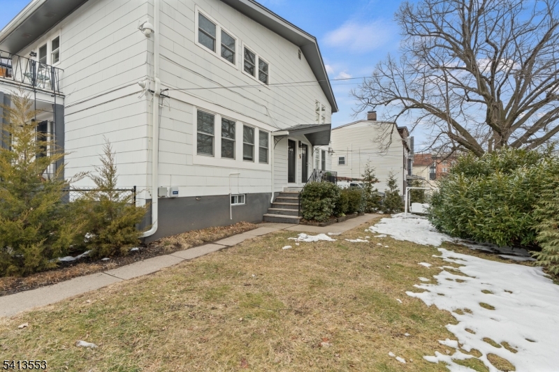 5 Washington Street Montclair, NJ 07042 - Photo 15 of 18 a front view of a house with a yard