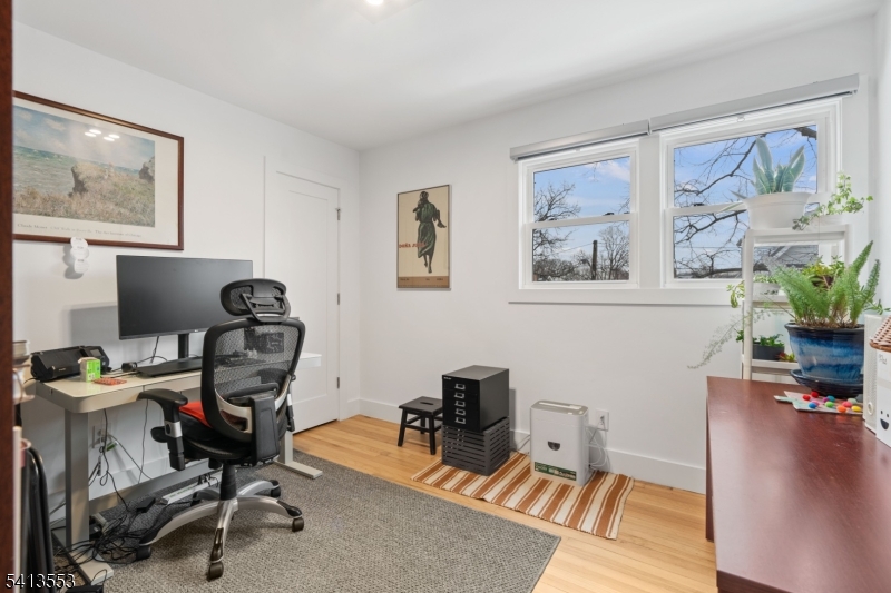 5 Washington Street Montclair, NJ 07042 - Photo 6 of 18 a view of a workspace with furniture and a window