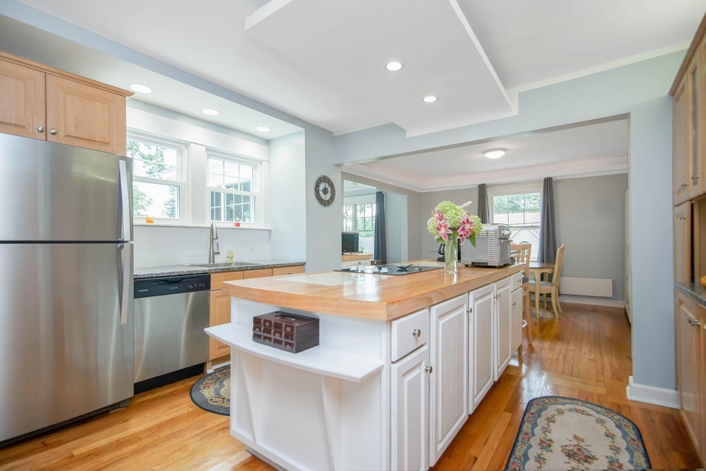 15 Three Rivers Road Wilbraham, MA 01095 - Photo 13 of 37 a large kitchen with kitchen island a sink stove and refrigerator