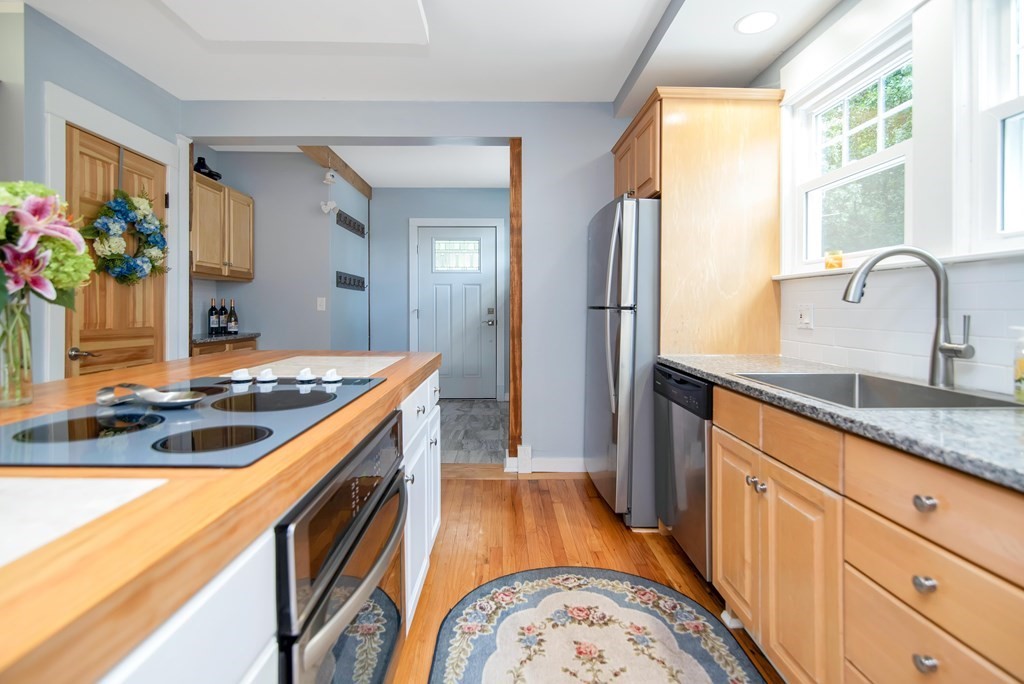 15 Three Rivers Road Wilbraham, MA 01095 - Photo 15 of 37 a kitchen with stainless steel appliances granite countertop a sink stove and refrigerator